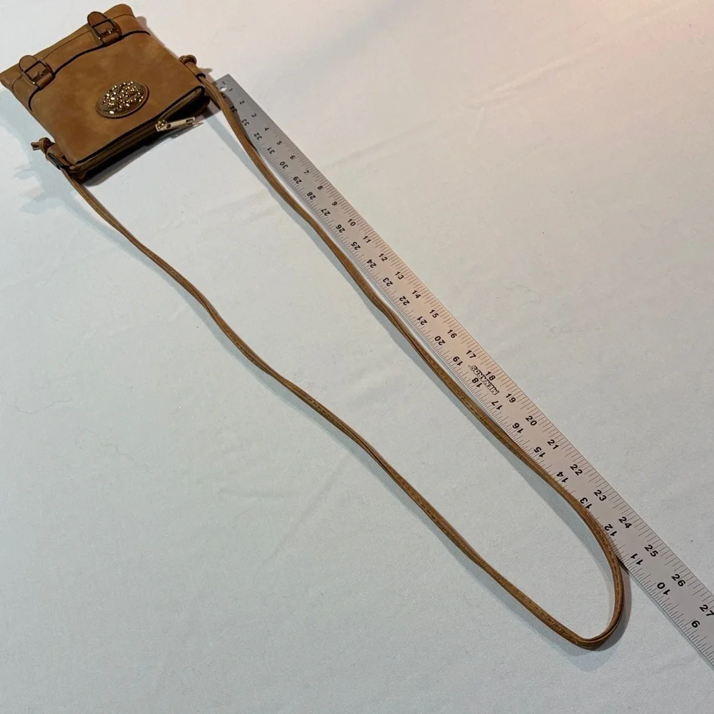 Elegant Tan Crossbody Leather Bag with Buckle Accents - Picture 6 of 9